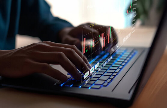 Business professional analyzing financial data on a laptop with graphical charts and data visualization for market research and financial analysis tasks - Powered by Adobe