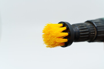 Brush attachment for power drill shows cleaning tool design