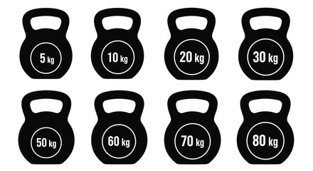 A collection of black kettlebells with varying weight markings displayed