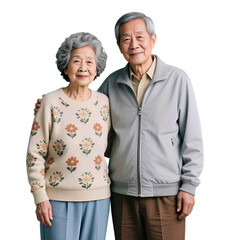 Smiling elderly Asian couple standing together in casual clothing