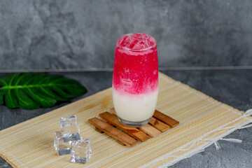 Red milk soda is a colorful, sweet, and creamy drink combining red syrup, milk, and soda over ice for a vibrant, fizzy refreshment. Popular at parties and loved for its unique flavor and presentation.