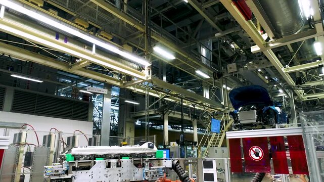 Factory Manufacturing Floor with Large Industrial Machinery and Equipment
