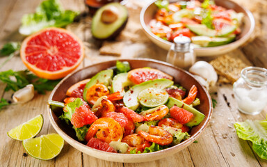 grilled shrimp with avocado and grapefruit. healthy delicious mixed salad