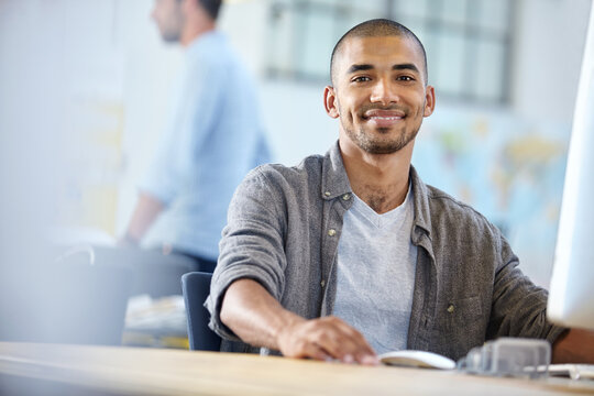 Portrait, creative and man with project, office and happy for design on computer and brand identity. Business, graphic designer and person with tech for research, smile and confident for digital art