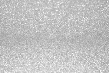 Abstract silver glitter sparkle texture with bokeh background