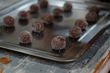 Sugar-Coated Cookie Dough Balls on Baking Tray