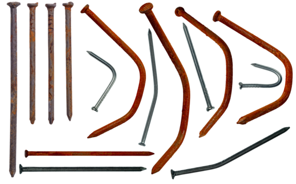 Isolated collection of new and rusty bent carpenter's nails on white background	
