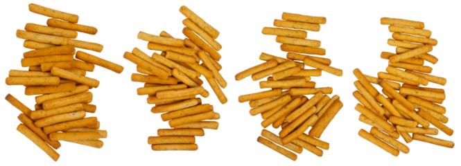Isolated piles of breadsticks on a white background