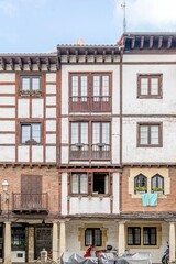 Traditional Half-Timbered Houses with Wooden Balconies and White Facades, Hondarribia