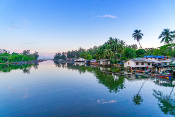 Fototapeta premium Riverside community in the morning at Narathiwat province, Thailand.