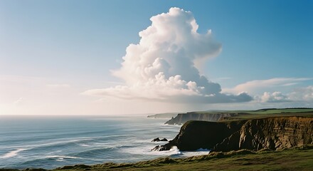 Coastal Cliffs Under a Dramatic Sky with a Large Cloud Formation.