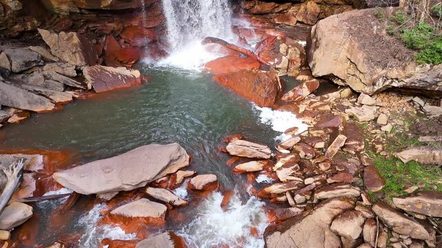 Douglas Falls waterfall with red rocks and pool on North Fork Blackwater River, Thomas, West Virginia, USA