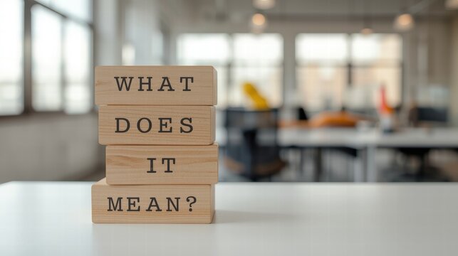 Uncover the meaning behind your business strategy. Wooden blocks spell out a key question, promoting purpose clarity and understanding in the modern workplace.
