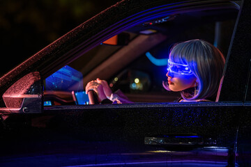Woman in futuristic glasses driving car with holographic display.