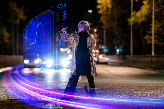 girl wearing futuristic AR glasses interacts with holographic map.