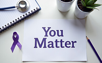 Epilepsy awareness message "You Matter" with a purple ribbon and medical items on a desk
