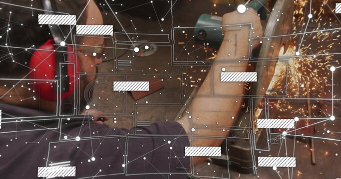 Grinding man using grinder in workshop with overlay, sparks flying wearing red muffs and glasses