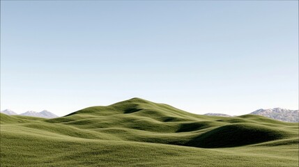 A serene landscape featuring undulating green hills and distant snow-capped mountains under a vast, clear blue sky.