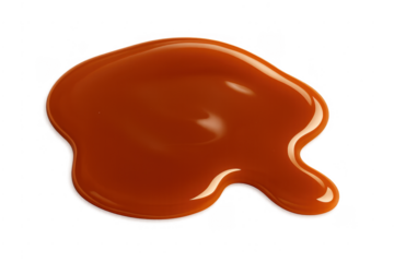 Golden caramel sauce pouring sweet liquid dessert