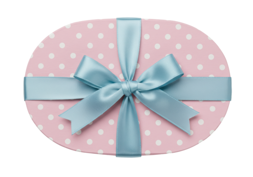 Isolated oval gift box decorated with polka dots and light blue satin ribbon and bow closure