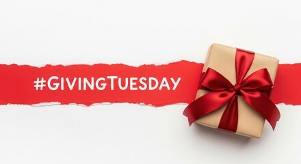 Giving tuesday holiday gift box with red ribbon and hashtag on torn paper