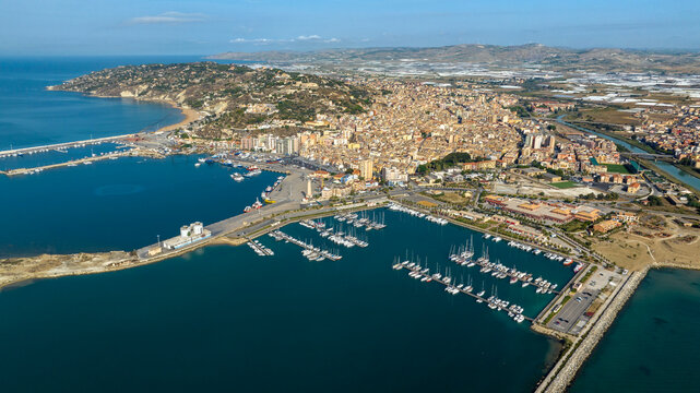 Aerial view of the city and port of Licata, a small town in the province of Agrigento, Sicily, Italy. The city overlooks the Mediterranean Sea.