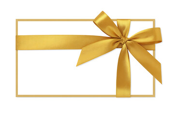 Golden ribbon tied in a bow on a blank gift card isolated on white background