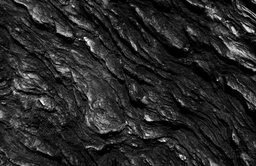 Dark rough stone wall background in vintage style for graphic design