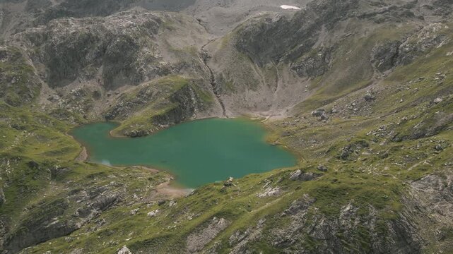 Scenic aerial view of a tranquil mountain lake in Gramais, peaceful setting