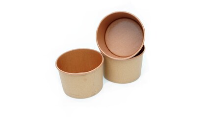 Side view closeup of empty single brown paper bowl isolated on white background