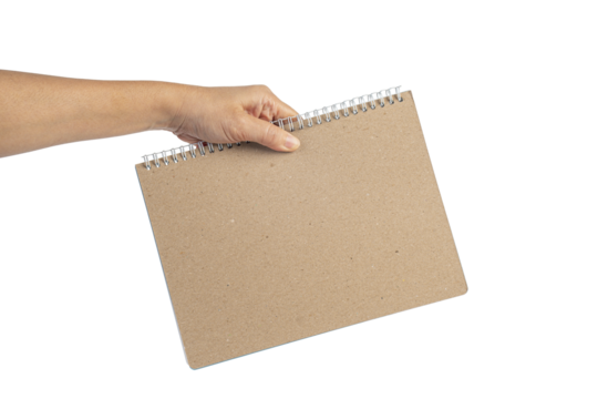 Blank book cover in hand on transparent background.