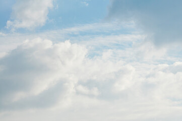 Beautiful storm clouds on a summer night with pinks and blues.
