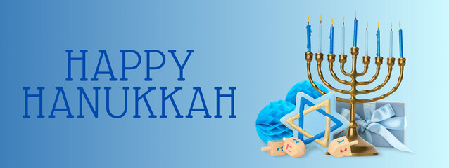 Colorful menorah with lit candles and dreidels next to gift boxes
