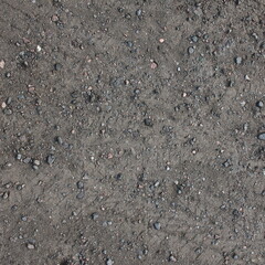 The texture of the asphalt surface on the highway