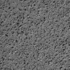 The texture of the asphalt surface on the highway