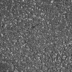 The texture of the asphalt surface on the highway