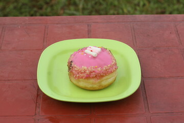 strawberry cake on green plate