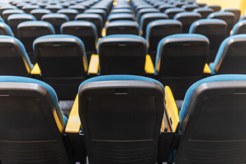 Naklejka premium Rows of Empty Theater Seats in Focus