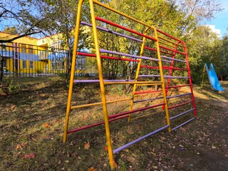 Children's playground in the park in autumn. Selective focus.