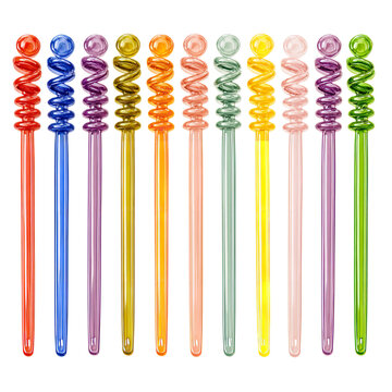 Colorful glass swizzle sticks isolated on transparent background, perfect for cocktail and drink decoration