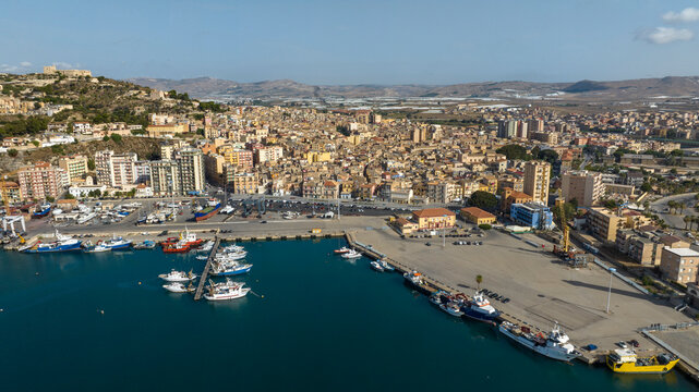 Aerial view of the port and city of Licata, a small town in the province of Agrigento, Sicily, Italy. The city seafront overlooks the Mediterranean Sea.
