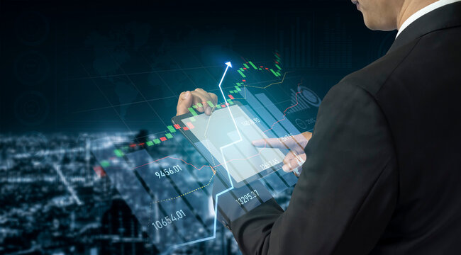 A businessman interacts with a tablet displaying stock market graphics and data analysis, symbolizing technological advancements in finance and investment strategies in an urban setting. Scalp - Powered by Adobe