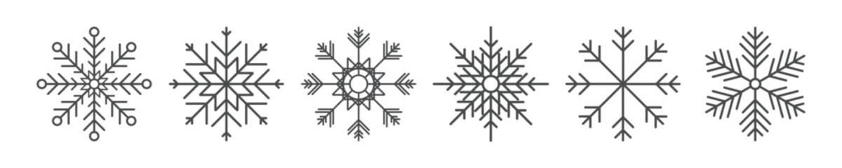 Simple line art snowflake icons: elegant winter decoration and christmas design elements. © Amit