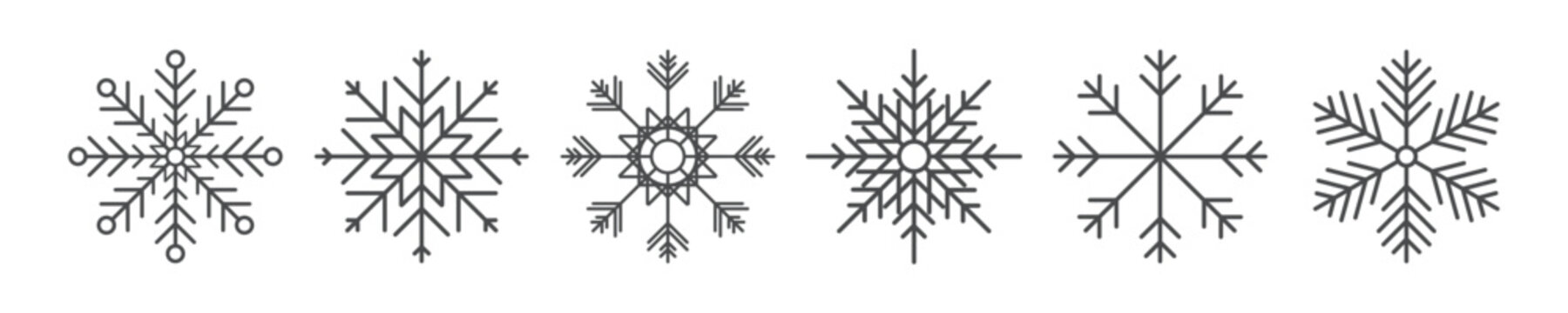 Simple line art snowflake icons: elegant winter decoration and christmas design elements.