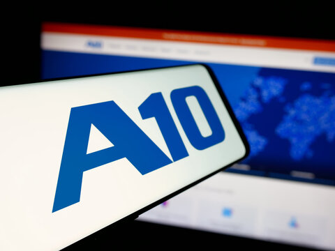 Stuttgart, Germany - 11-12-2025: Smartphone with logo of US company A10 Networks Inc. on screen in front of website. Focus on center-left of phone display.