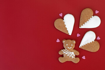 Gingerbread bear and hearts decorated with white icing, copy space for text