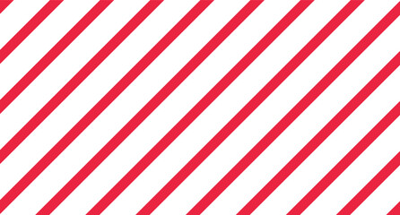 Fototapeta premium Striped candy cane Christmas or New Year decoration pattern, red and white diagonal stripes background, Xmas gift wrap, winter holiday present wrapping paper