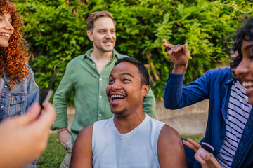 Diverse friends enjoying outdoor makeup session and self expression