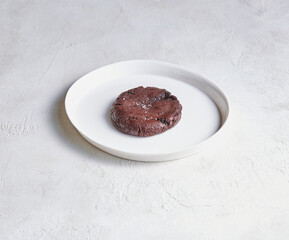 A plate filled with assorted cake and pastry pieces, photographed to highlight texture, color, and appetizing detail.