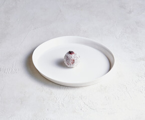 A plate filled with assorted cake and pastry pieces, photographed to highlight texture, color, and appetizing detail.